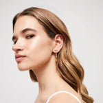 Uno de 50 18K Gold Plated Hoop Earrings With White Topaz