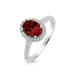 Silver Claw Set Oval Shape Halo Style Ruby Coloured CZ Ring